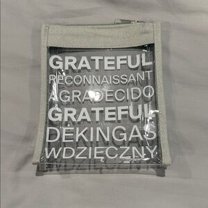 Gray Transparent Pouch with Multilingual 'Grateful' Print